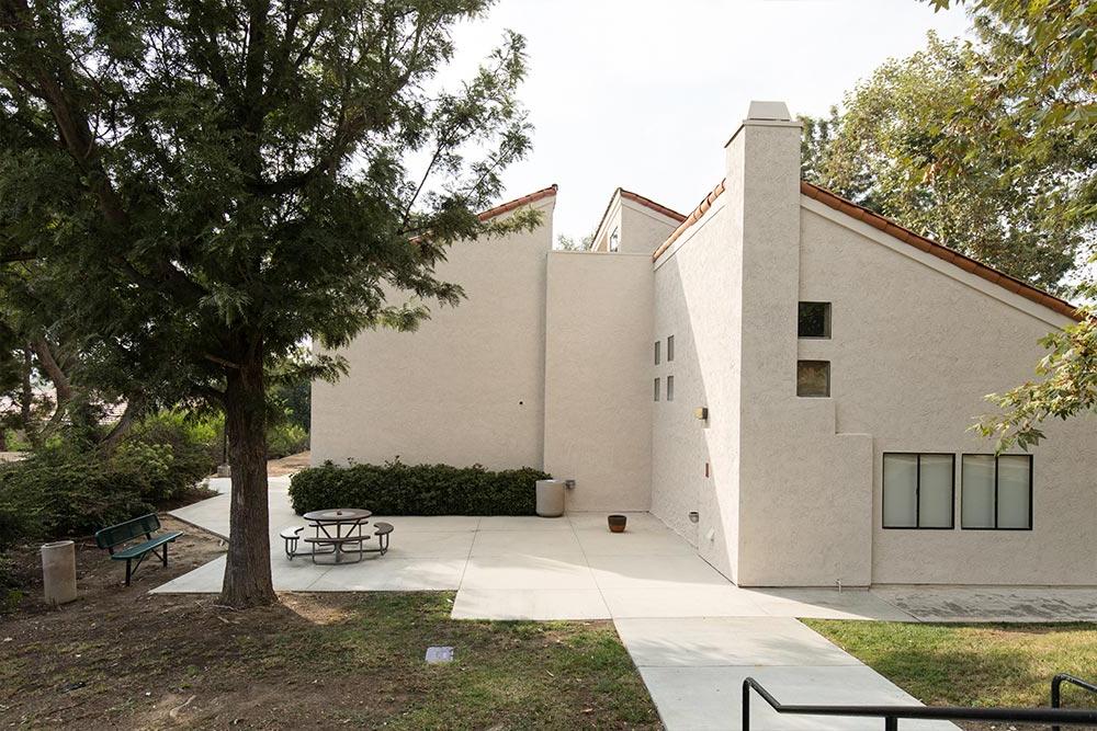  The patio outside Chi Alpha is a popular location for students and faculty to engage in conversation.